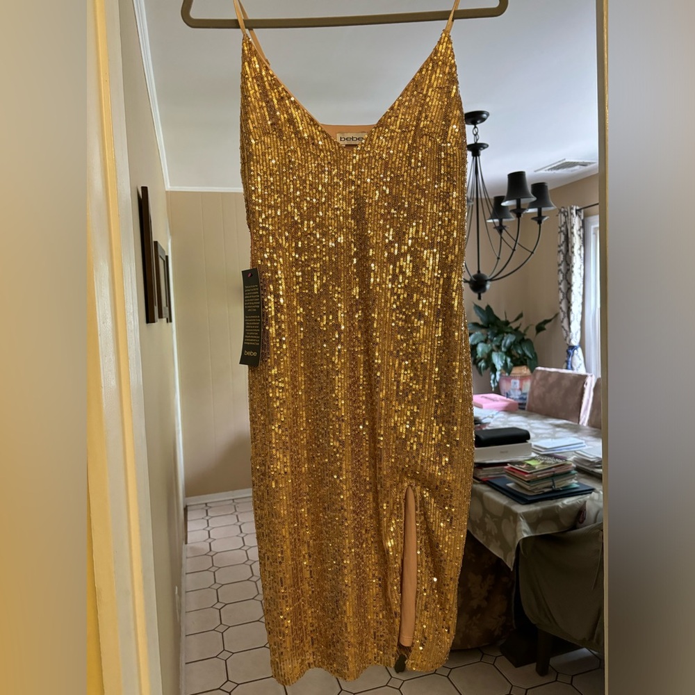 Brand new with tags Bebe gold sequined midi dress. I ordered a few dresses.
